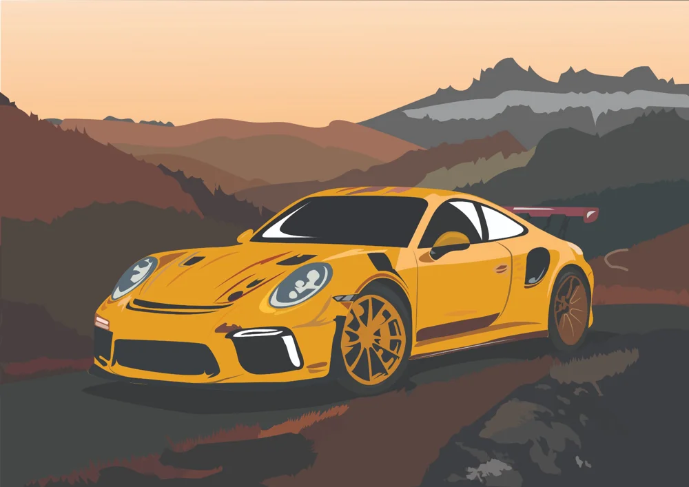Yellow sports car in a mountain landscape at sunset